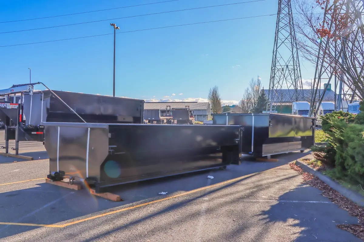 Roll-off dumpster ready for waste disposal at job site for 12 Yard Dumpster Rental in Pompton Lakes